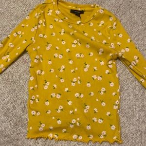 yellow longsleeve shirt